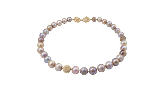Contemporary pearl jewelry - this modern pearl necklace features gorgeous lustrous freshwater pearls.   Custom pearl jewelry featuring colored pearls is becoming more and more popular
