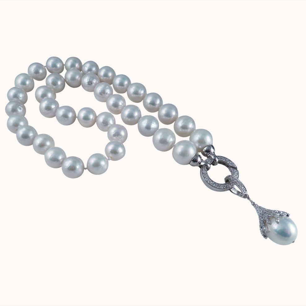White pearl jewelry is always approriate.  Contempory white pearl necklace  designed and created by Jewelry Olga Montreal Canada