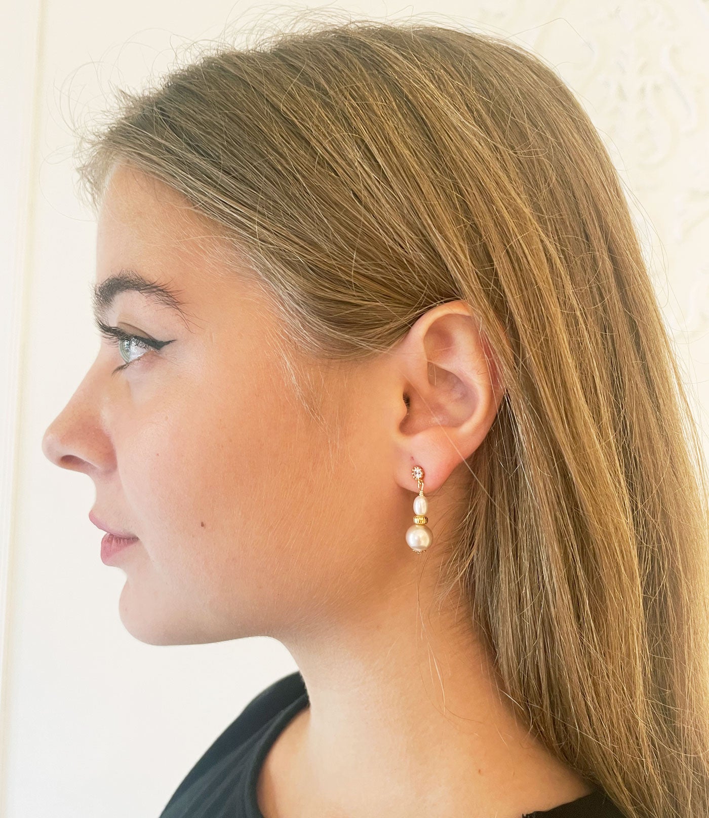 Beautiful contemporary pearl earrings featuring gorgeous freshwater pearls with amazing pink color.  Perfect fashion accessory for a stylish contemporary woman