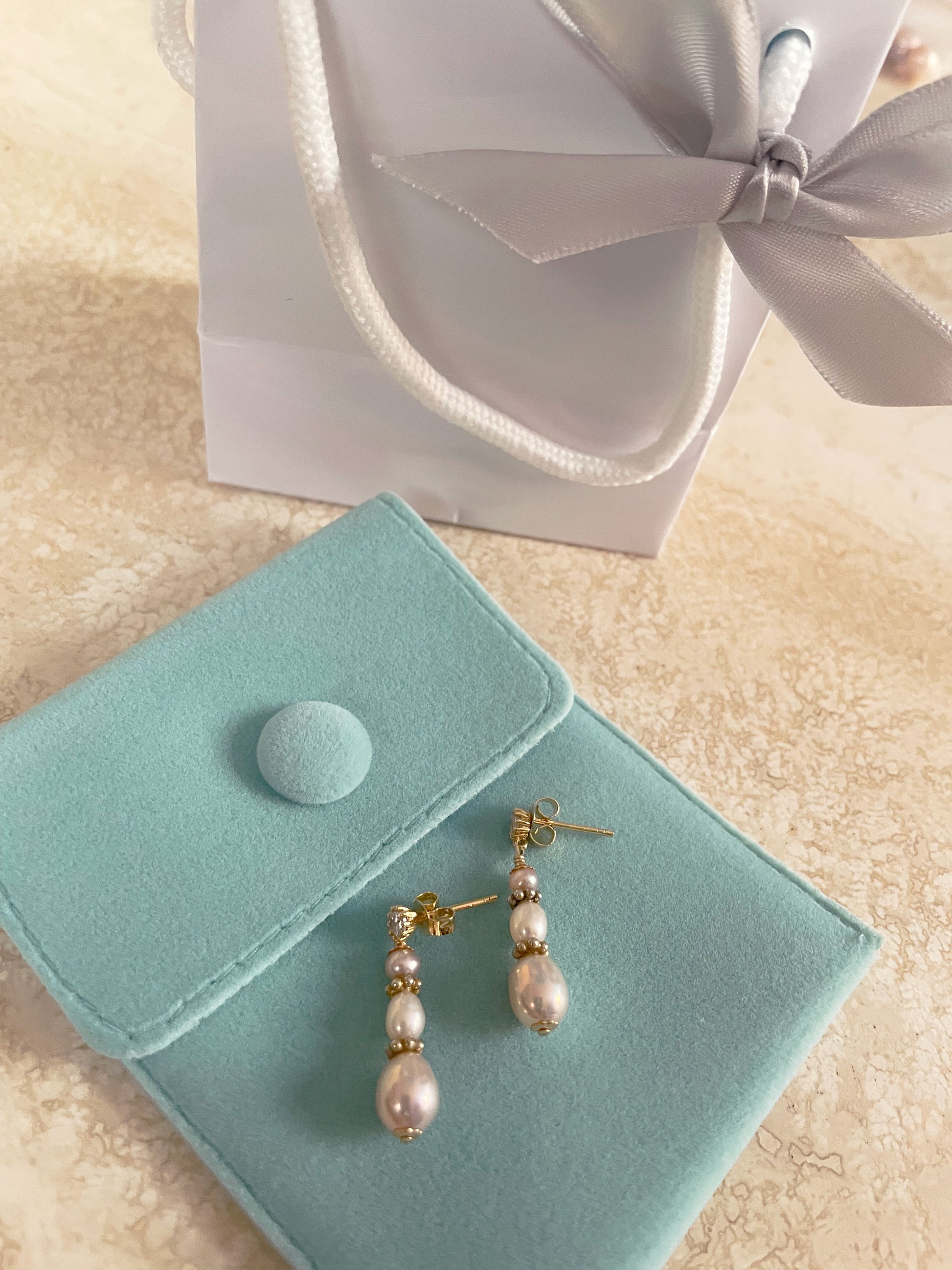 Beautiful glowing pearl earrings is a wonderful fashion accessory
