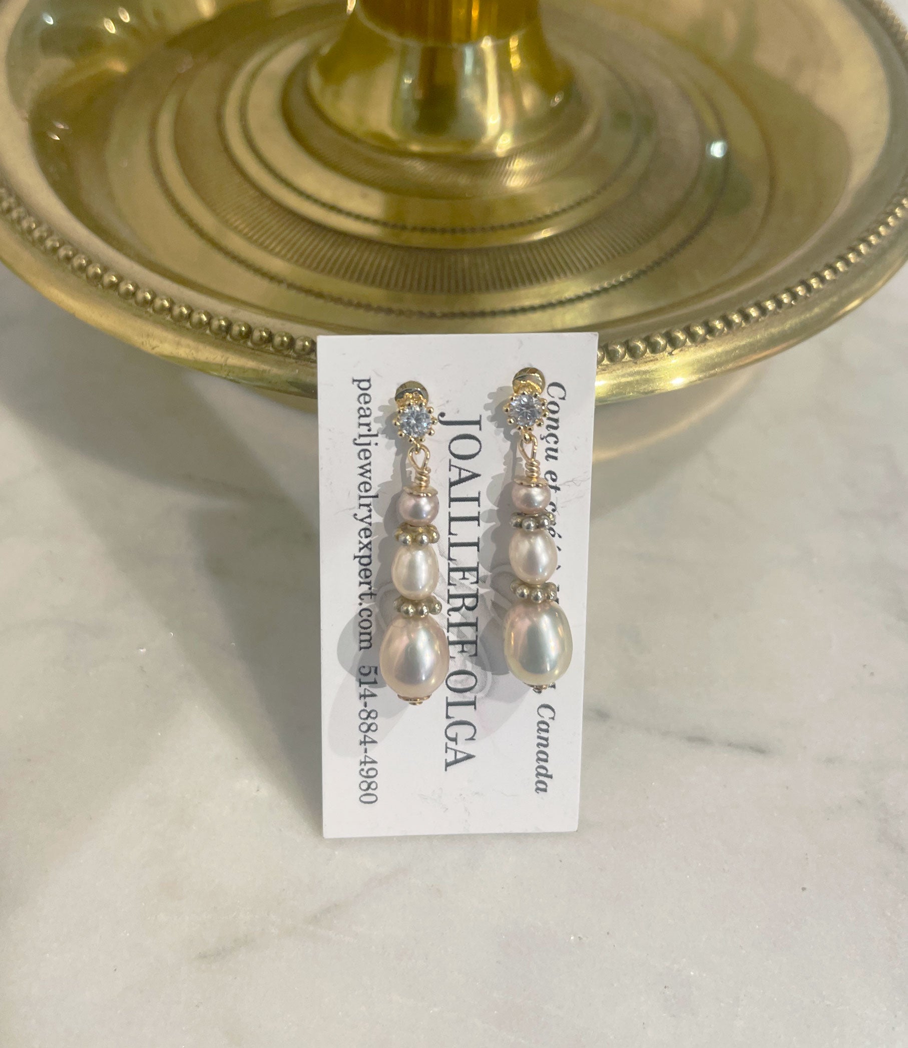 Beautiful glowing pearl earrings will finish your look