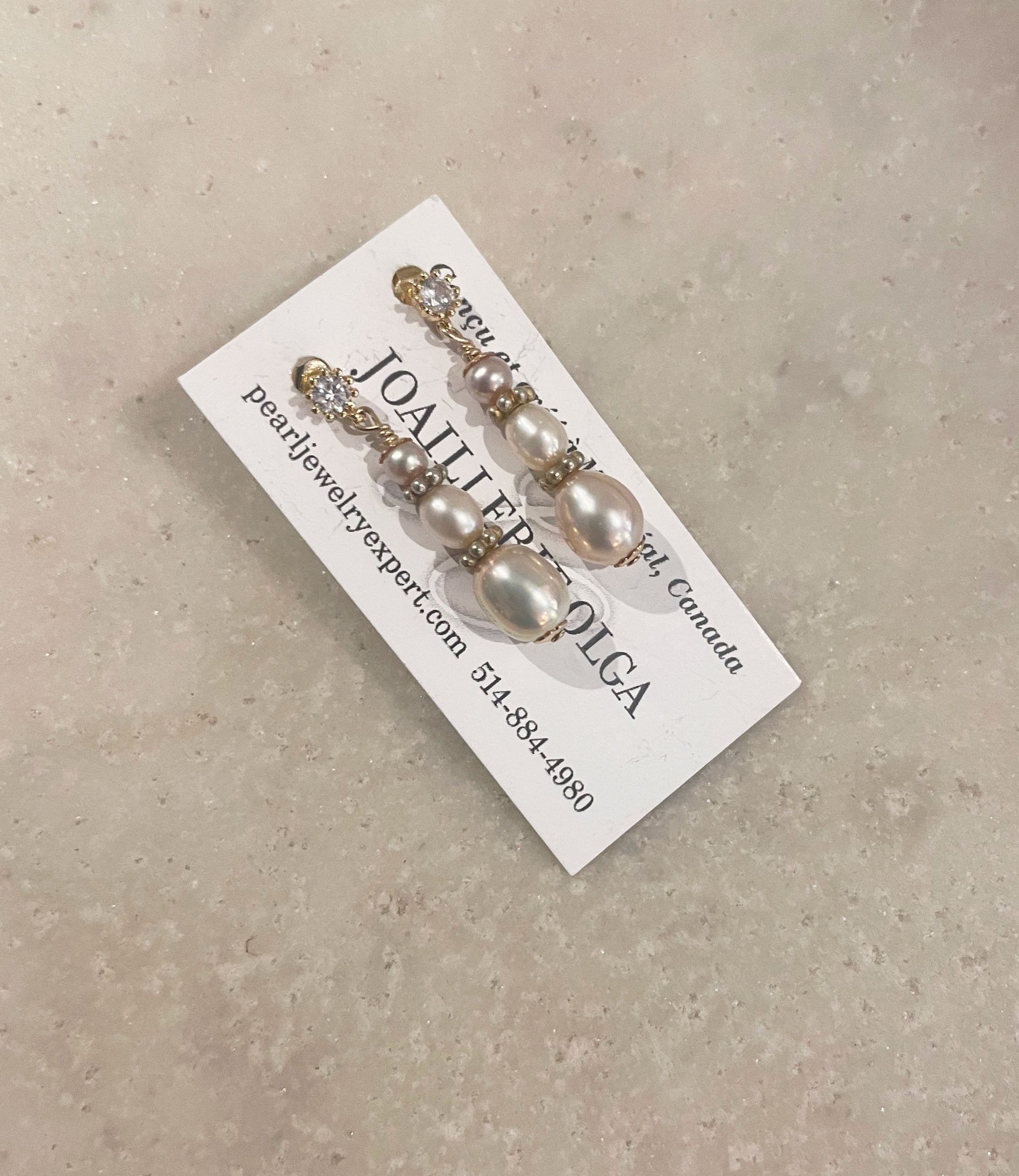 Beautiful glowing pearl earrings feature gorgeous real pink pearls.  Custom pearl jewelry