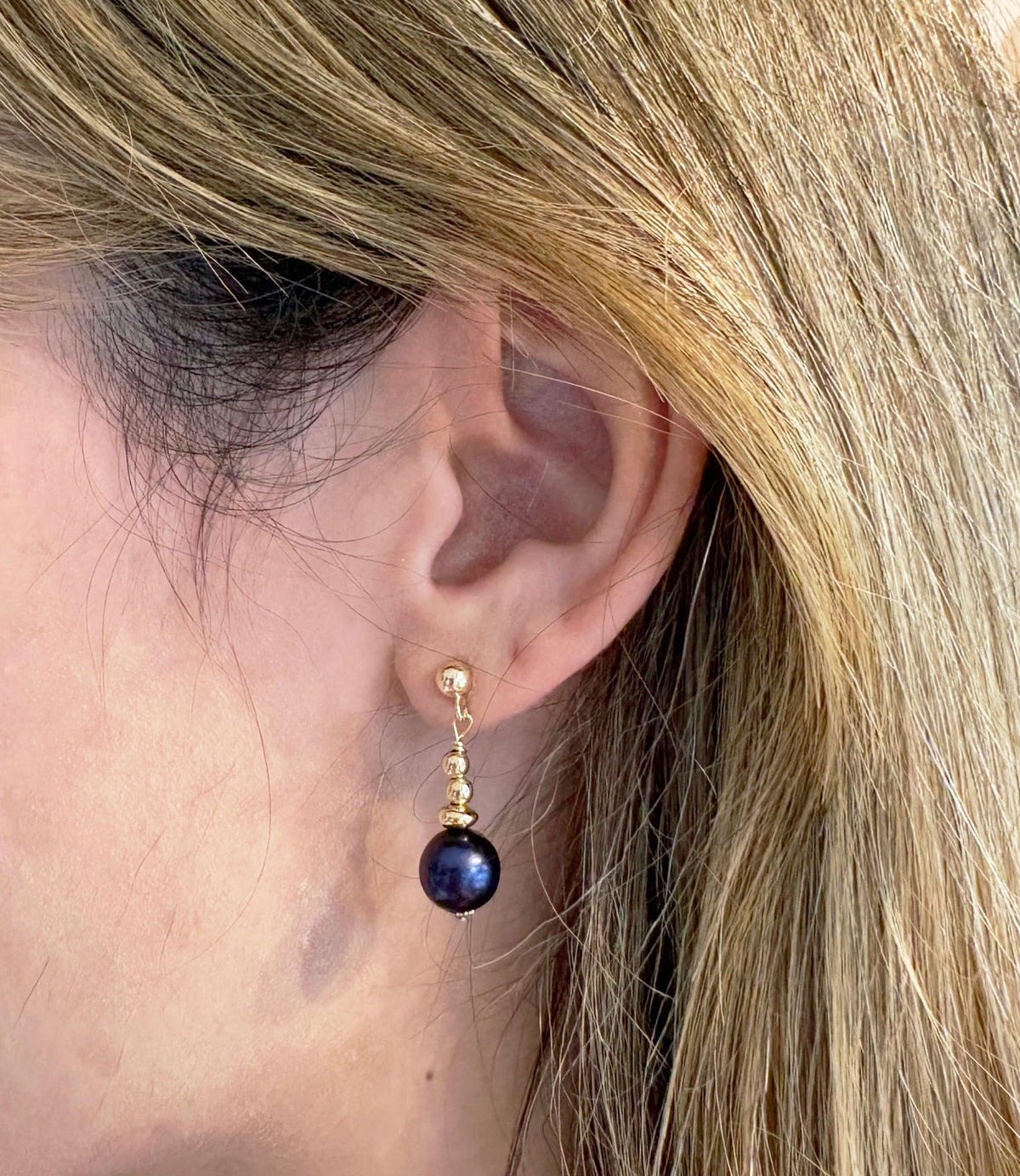 Contemporary black pearl jewelry features luminous freshwater black pearls.  Custom pearl earrings will finish any look