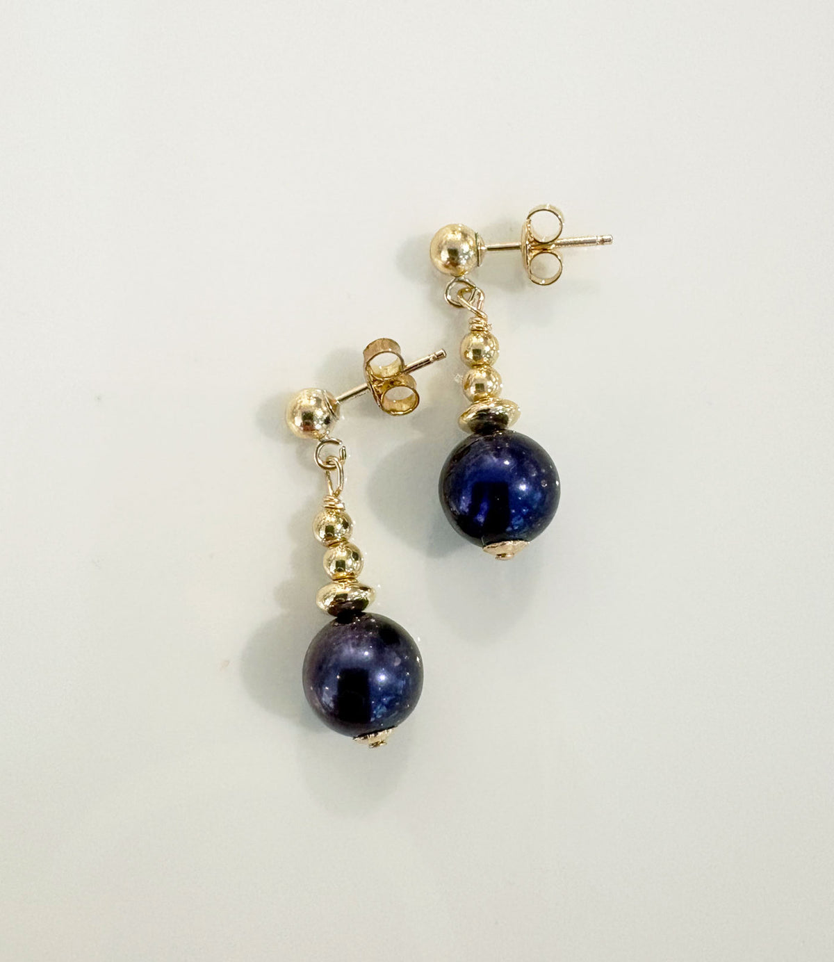 Modern dangling black pearl earrings - a perfect jewelry gift for her