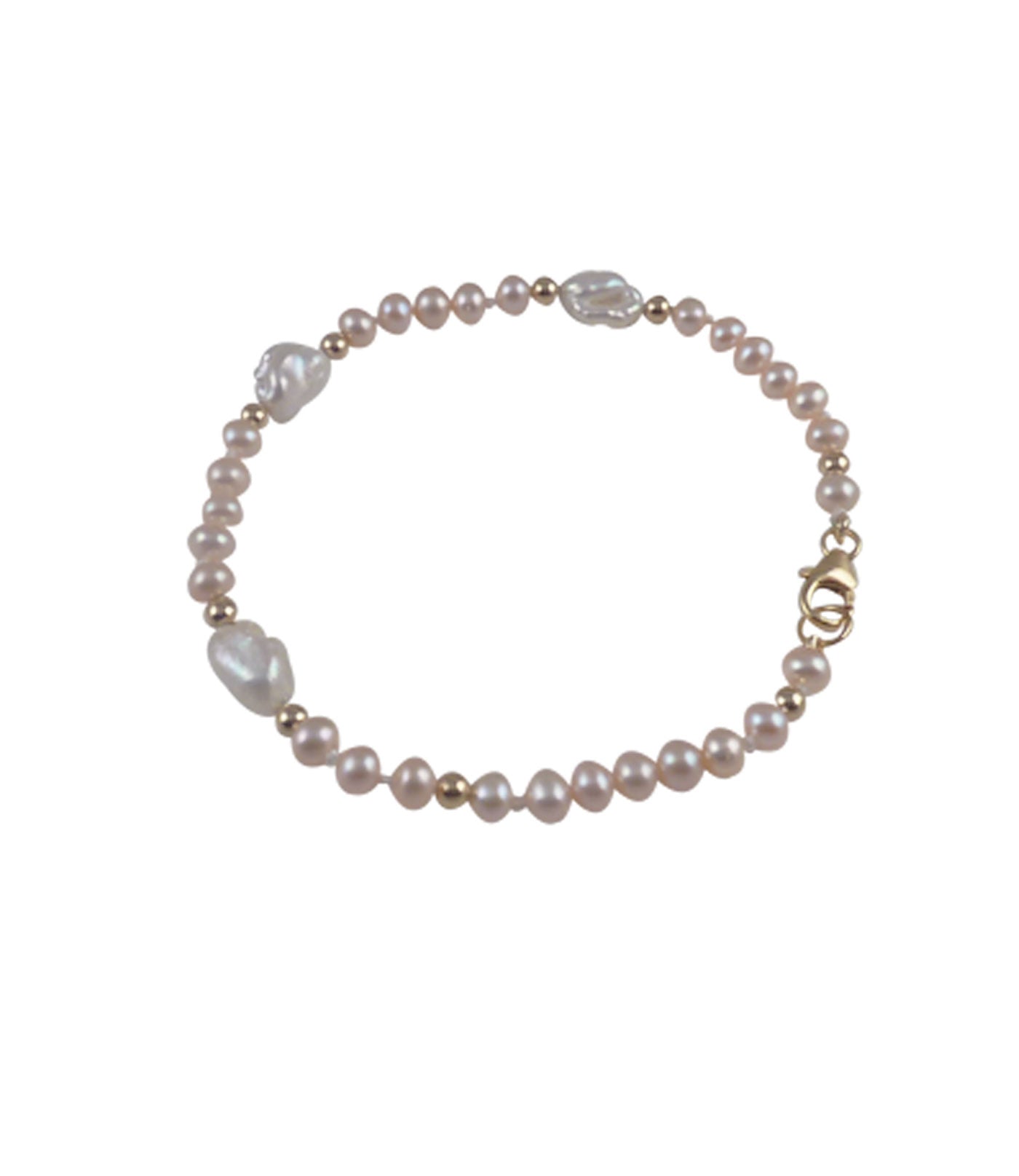 Dainty pink pearl bracelet featuring real freshwater pink pearls and white keshi pearls.  Contempory pearl jewelry for everyday wear.
