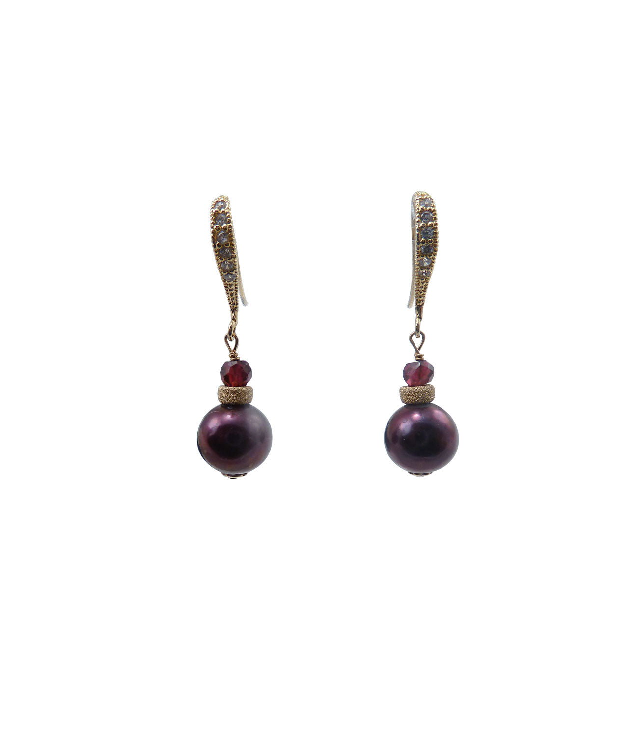 Dangling black pearl earrings with garnet will finish your contemporary look