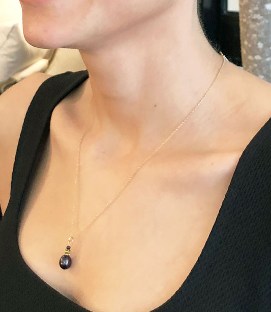 Delicate black pearl pendant necklace will finish your look.  Black pearl jewelry always adds drama