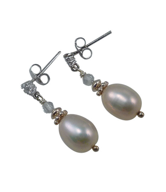Delicate dangling pearl earrings - custom pearl jewelry.  Contemporary pearl earrings may be worn on any occasion