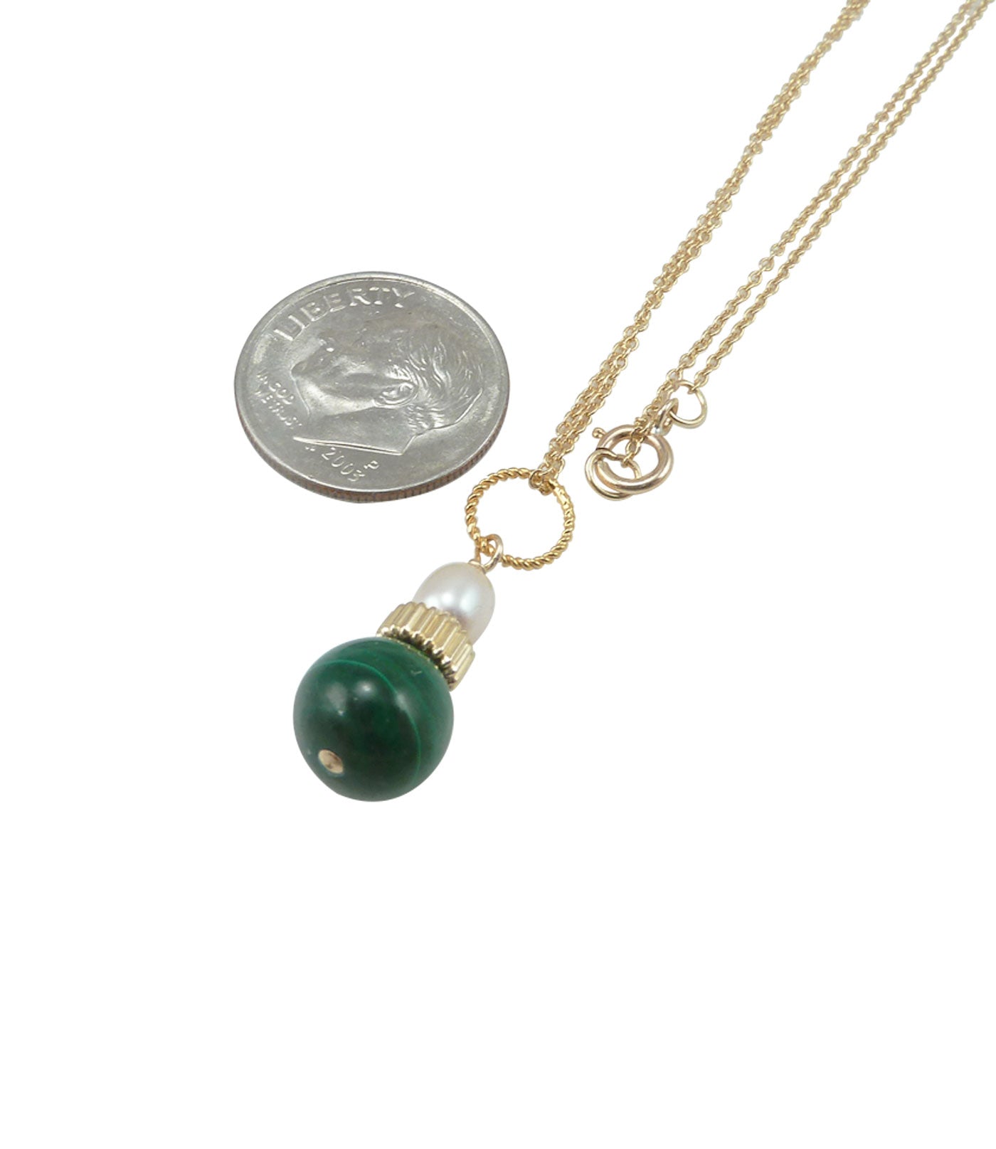 Delicate malachite and pearl pendant features a real pink pearl paired with green malachite.