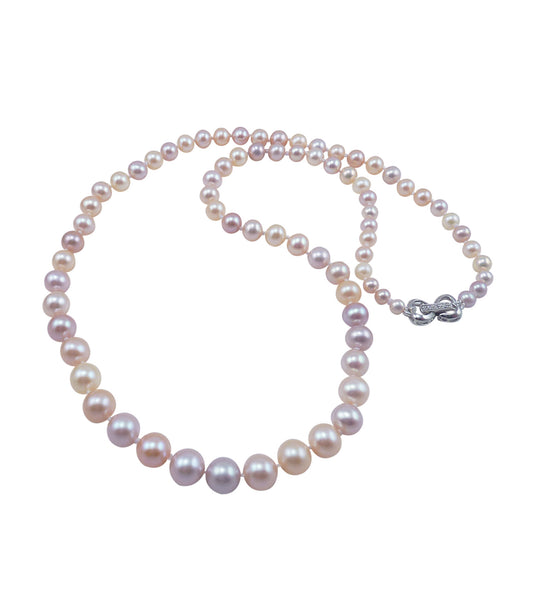 Delicate pink pearl necklace feature beautiful pink pearls of various shades