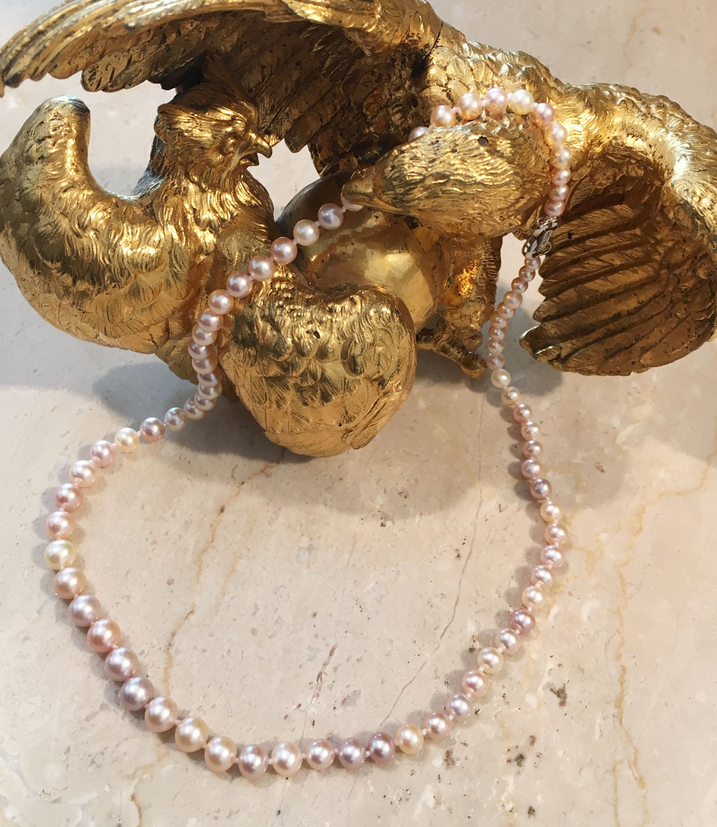 Delicate pink pearl necklace may be worn daily.  Classic pearl jewelry with a modern twist.