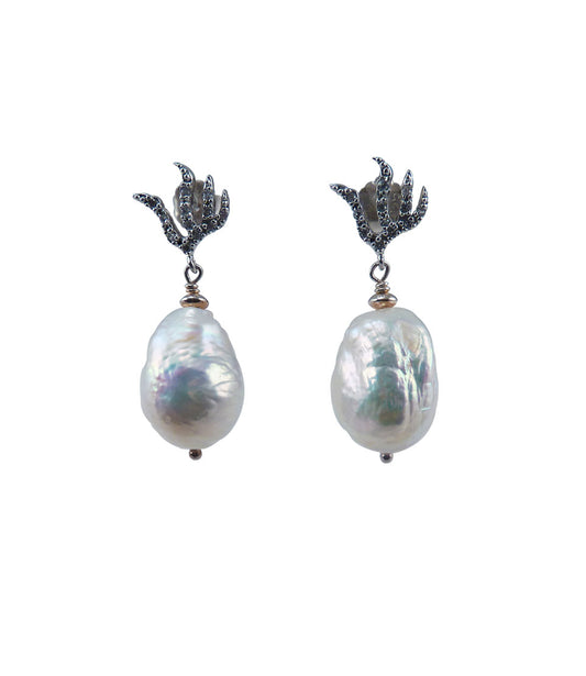 Elegant baroque pearl earrings featuring freshwater white baroque pearls.
