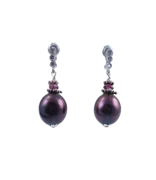 Elegant dangling black pearl earrings featuring gorgeous freshwater black pearls paired with natural wine-rd garnet