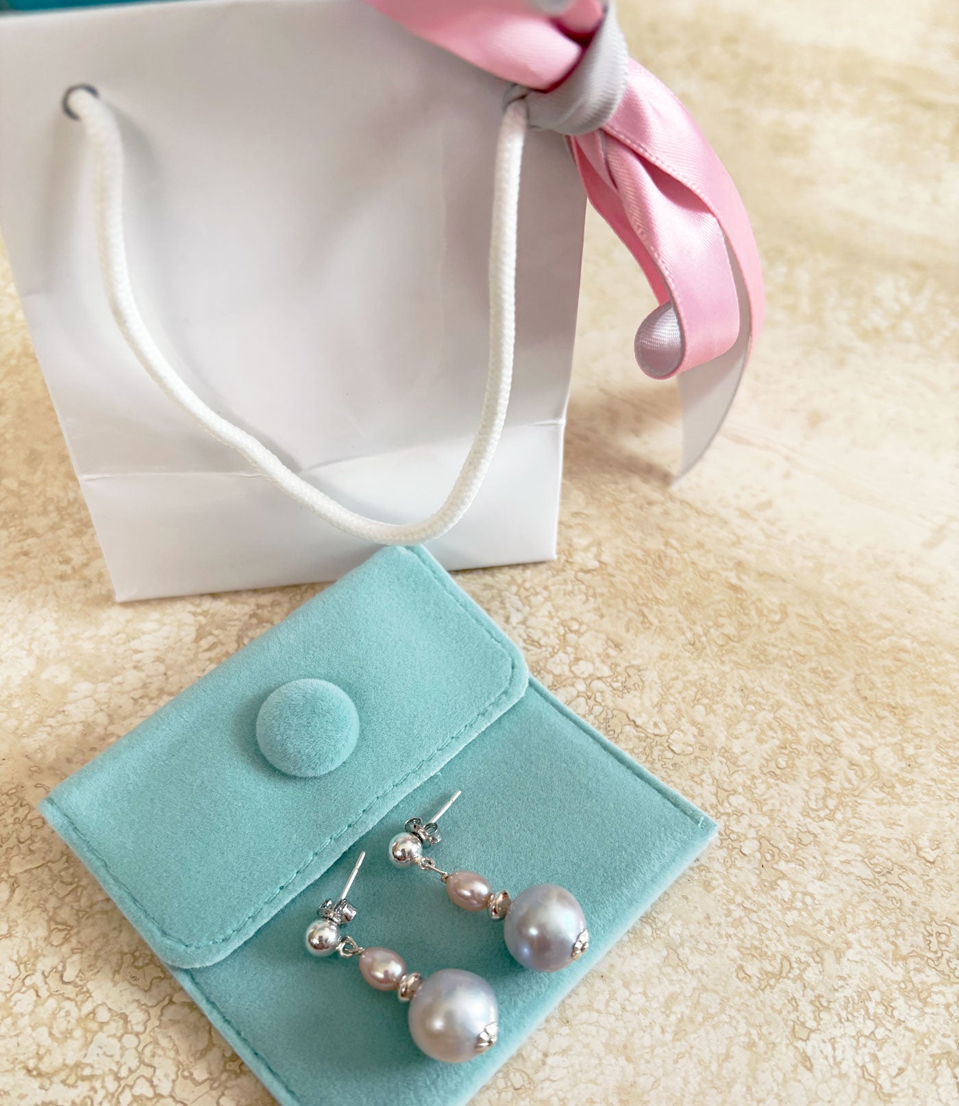 Elegant grey and pink pearl earrings are a wonderful jewelry gift