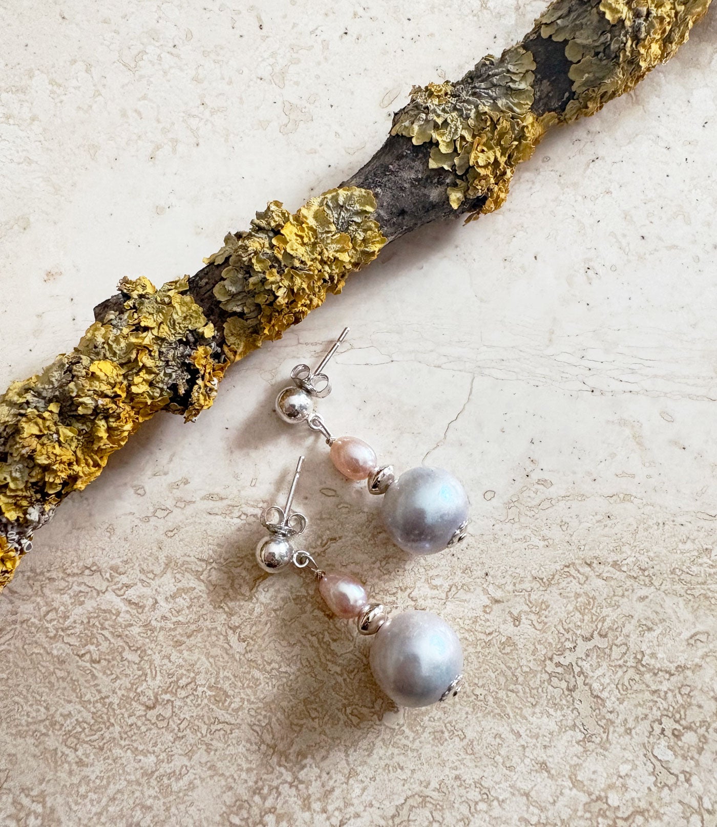 Elegant grey and pink pearl earrings feature freshwater grey pearls and pink oval pearls
