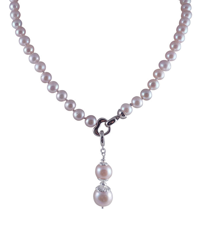 Elegant pink pearl necklace featuring beautiful freshwater pink pearls