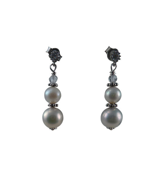Elegant white pearl earrings featuring lustrous freshwater pearls