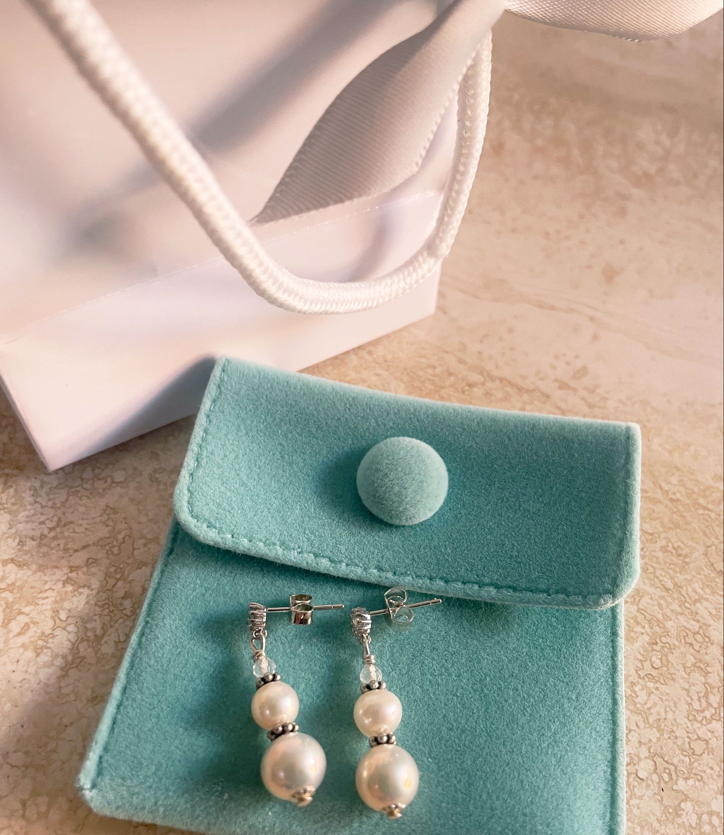 Elegant white pearl earrings featuring freshwater white pearls paired with rock  quartz