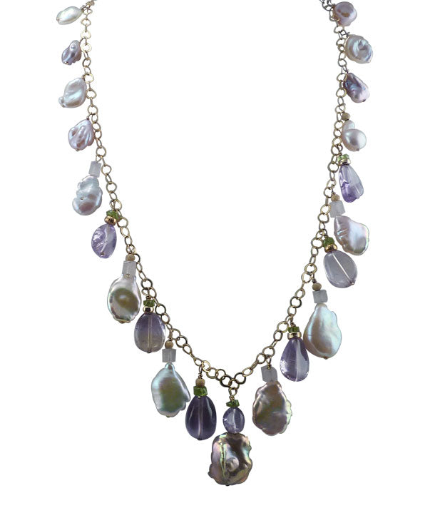 Exquisite fringe pearl necklace with gemstones.  Trendy modern unique pearl jewelry.  Fringe pearl jewelry is a big trend now
