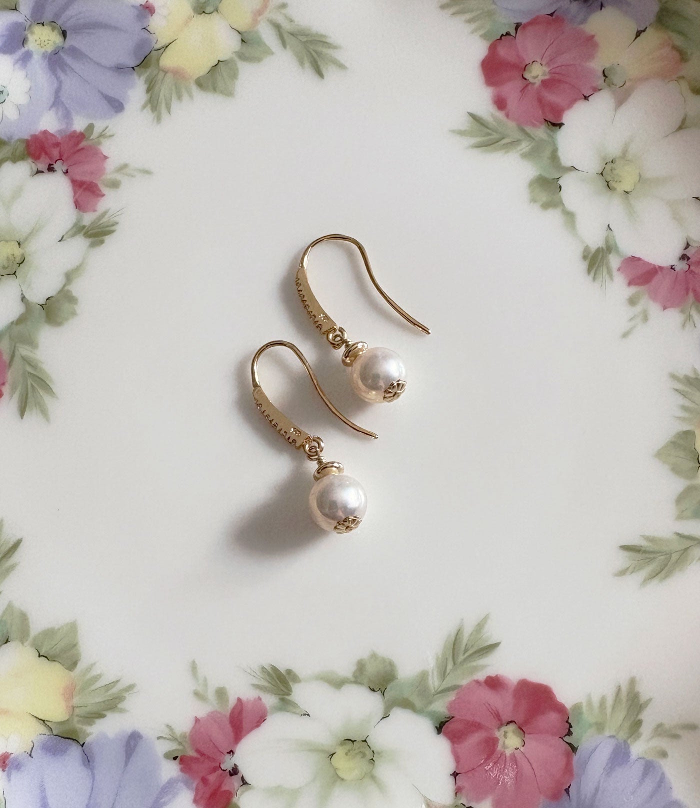 Golden dangling pearl earrings.  Beautiful contemporary pearl jewelry