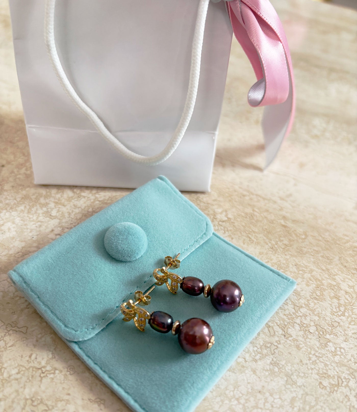 Gorgeous black pearl earrings in stylish setting designed and created by Jewelry Olga Montreal Canada