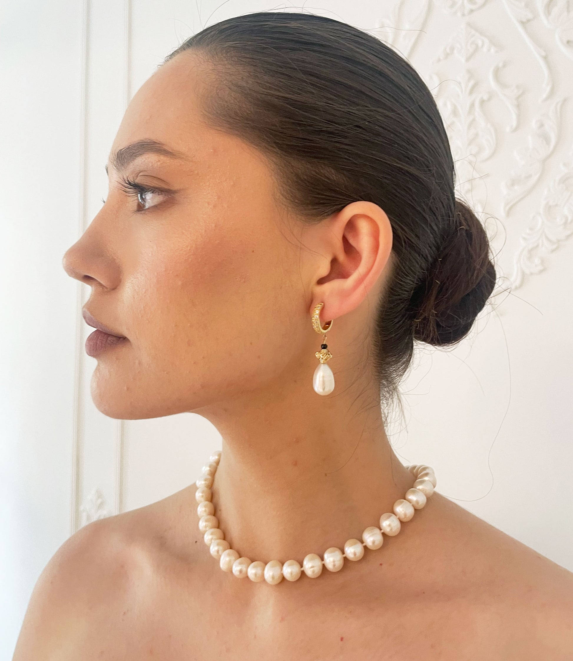 Gorgeous white drop pearl earrings featuring beautiful freshwater pearls are designed and created by Jewelry Olga Montreal Canada