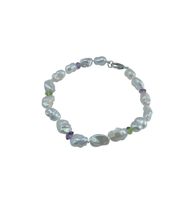 Keshi pearl bracelet with peridot and amethyst features cultured freshwater keshi pearls.  Modern pearl jewelry for stylish women.  Custom real pearl bracelet is a great jewelry gift for her
