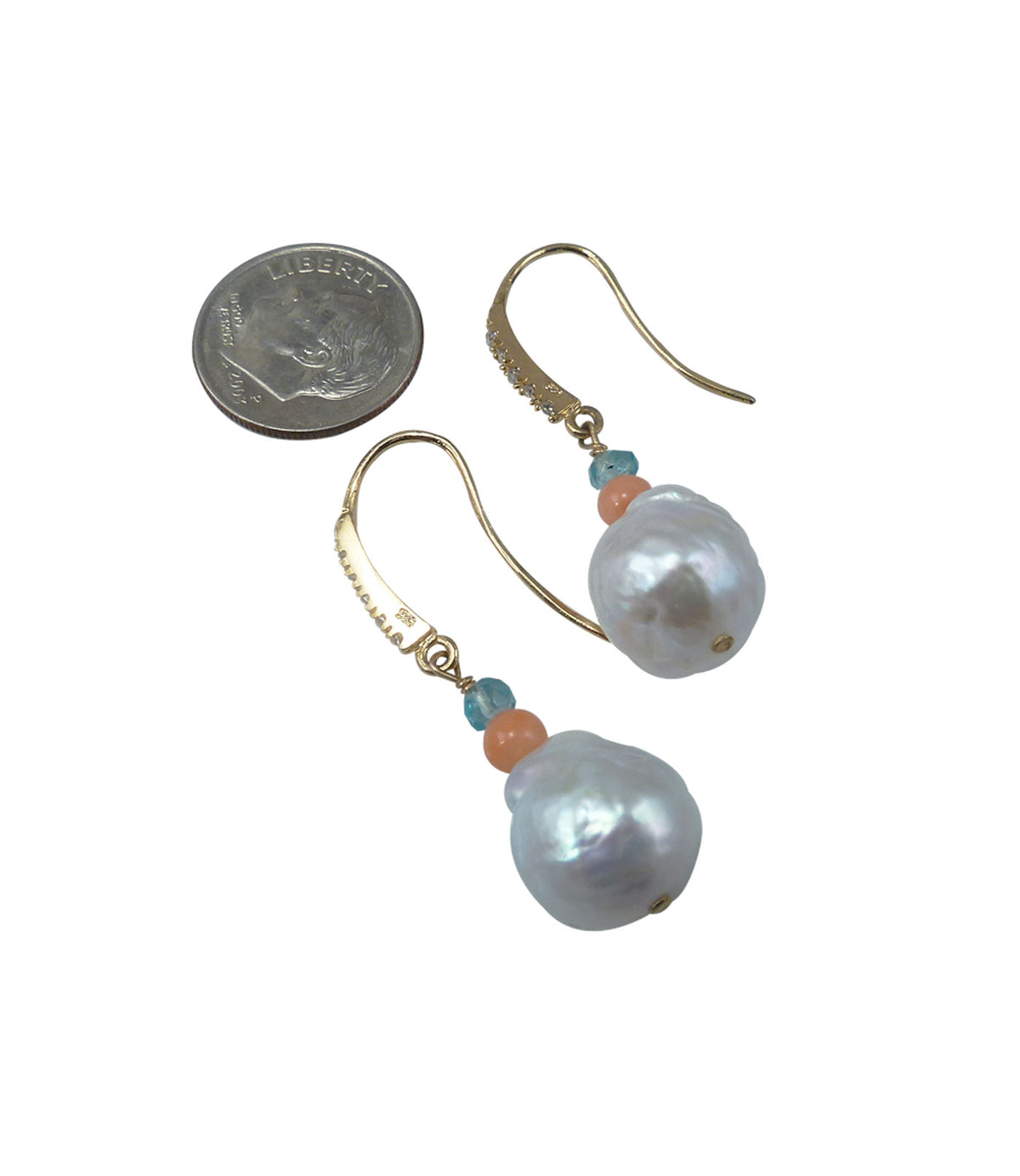 Modern dangling white pearl earrings.  Contemporary unique pearl jewelry featuring white Chinese Kasumi pearls.  White pearl jewelry