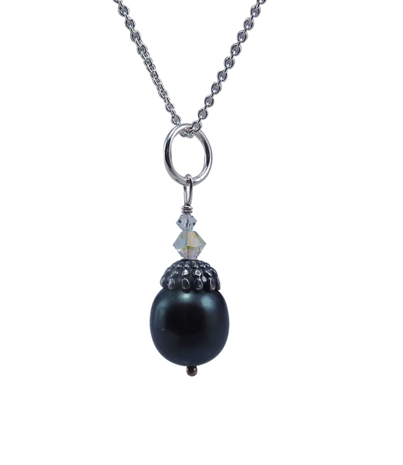 Lovely black pearl pendant necklace features an ovalfreshwater "black" pearl.  Perfect fashion accessory for everyday wear for fashion-forward women