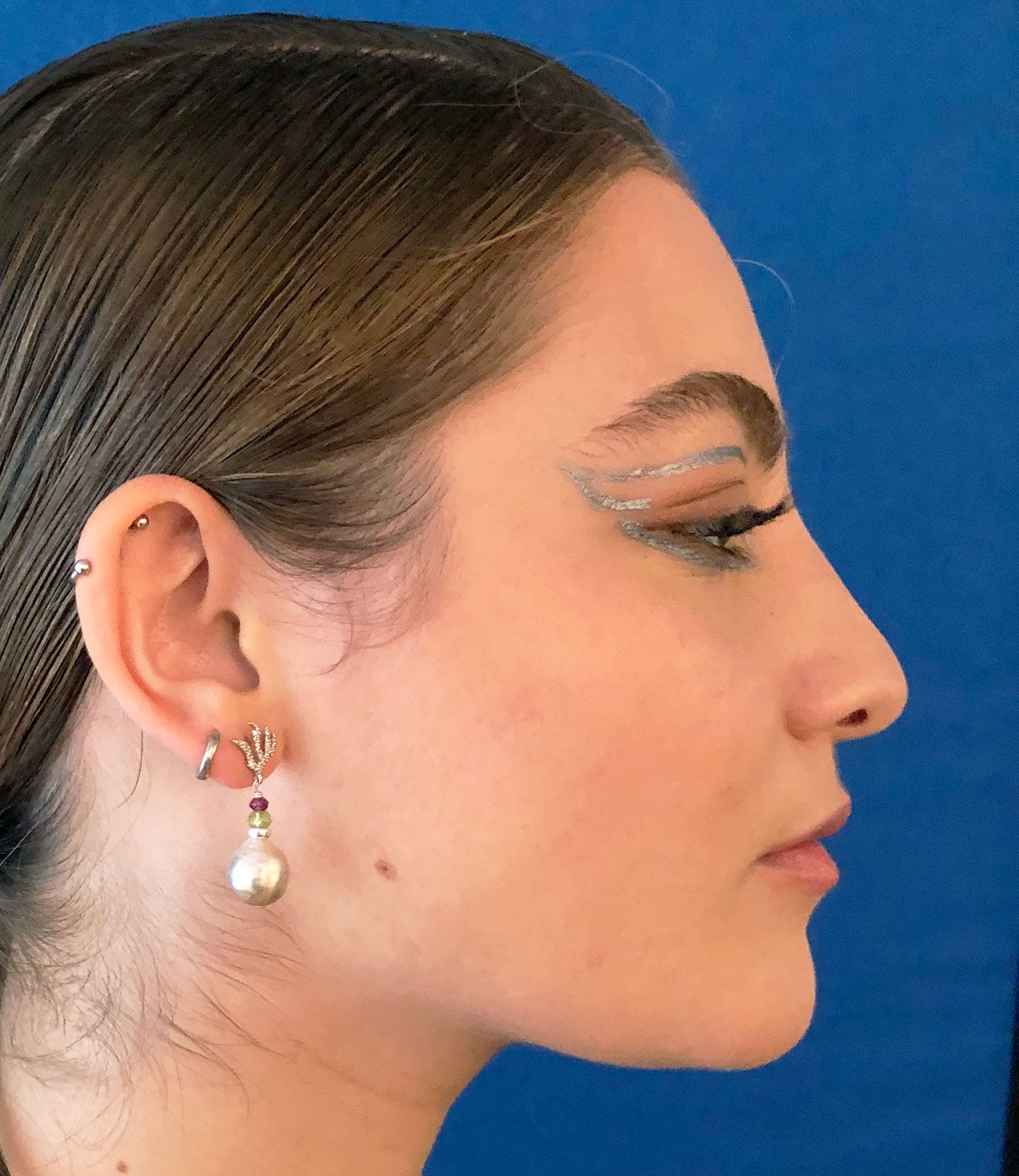 Contemporary unique pearl earrings will  finish your look.  Elegant pearl jewelry for fashion-forward women