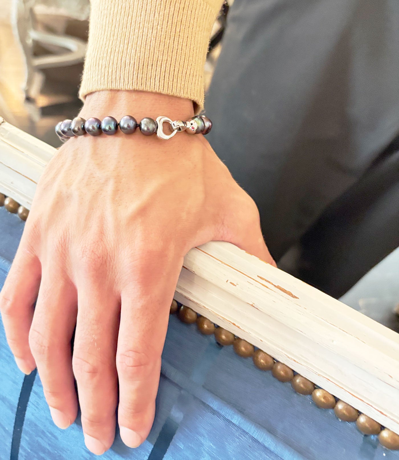 Modern mens black pearl bracelet is a stylish fashion accessory.  Custom black pearl jewelry featuring freshwater pearls