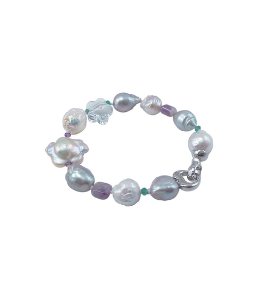Modern pearl bracelet, pink quartz, amethyst.  This custom pearl jewelry features freshwater pearls paired with colored gems.  Contemporary pearl bracelet for fashion-forward women