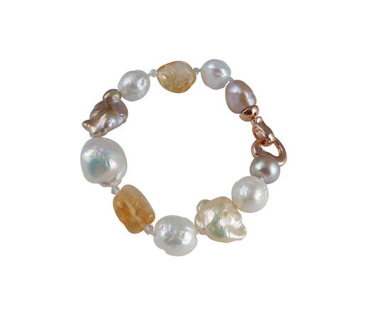 Modern pearl bracelet with citrine is a gorgeous fashion accessory.  This custom pearl jewelry features real pearls.