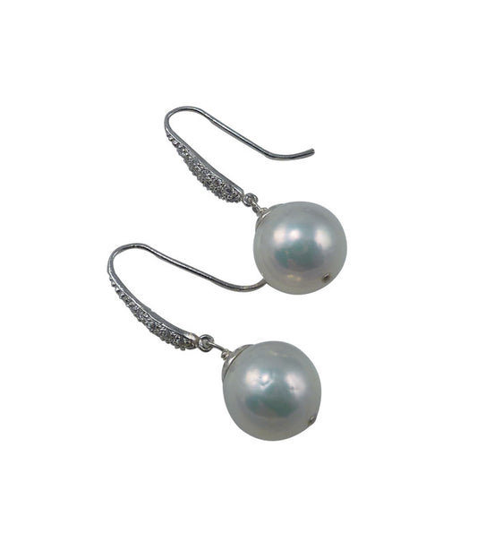 Contemporary pearl jewelry - genuine pearl earrings featuring freshwater Chinese Kasumi pearls. 