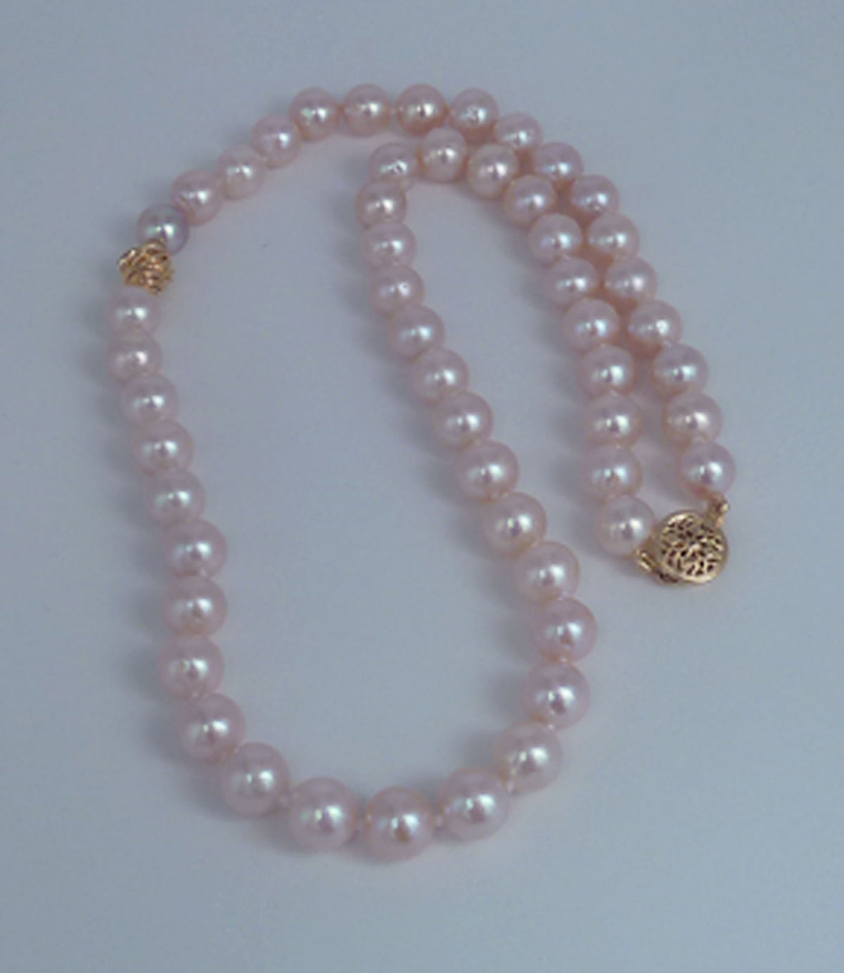 Contemporary pearl jewelry - a pink pearl necklace with golden accent.  Perfect jewelry gift  for her