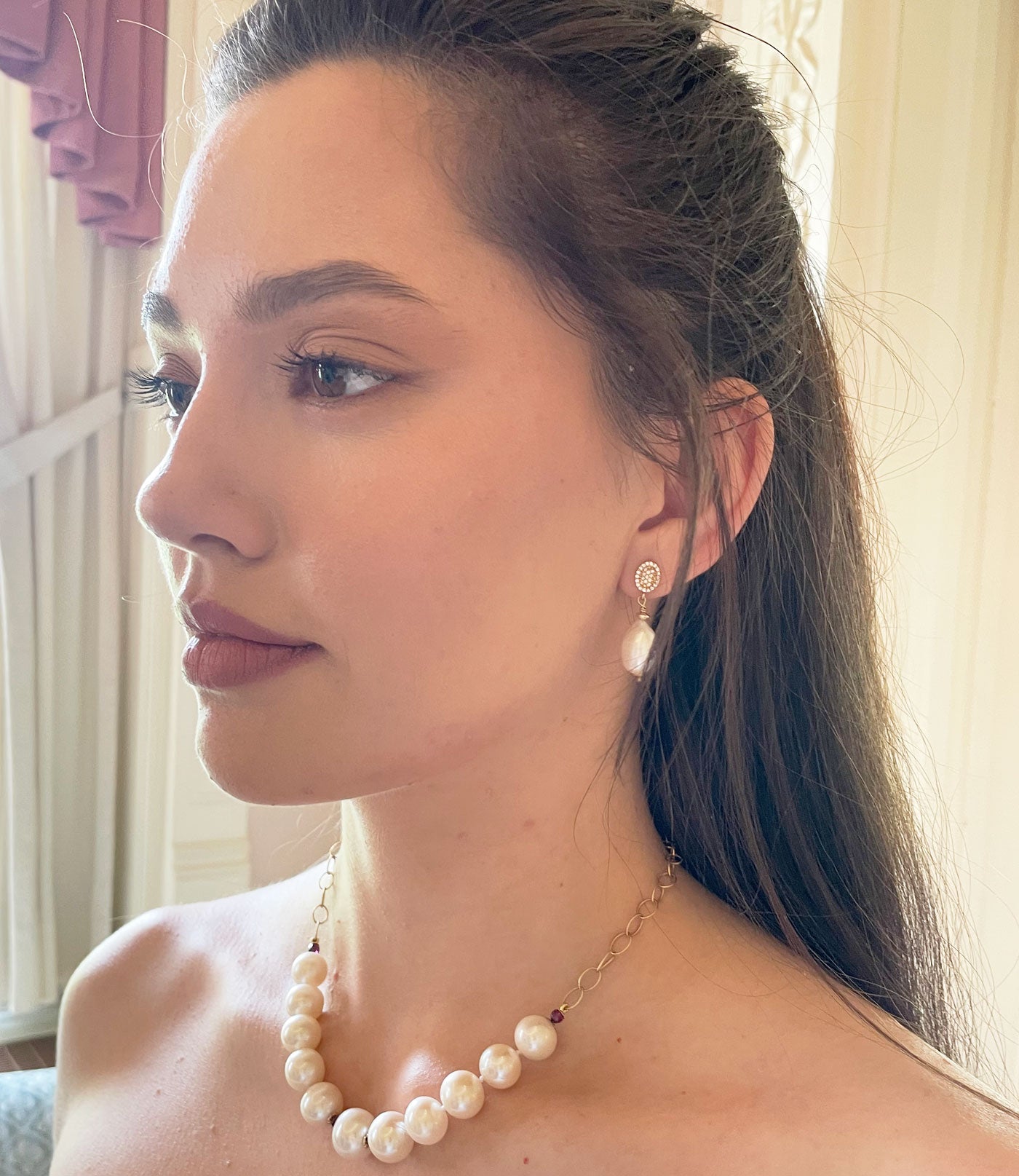 Modern white pearl necklace on chain.  This beautiful white pearl jewelry will finish your look and make you stand out