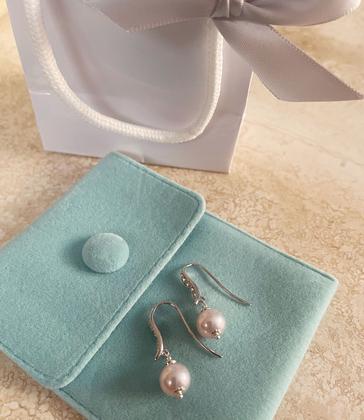 Contemporary genuine pearl earrings is a perfect jewelry gift for her