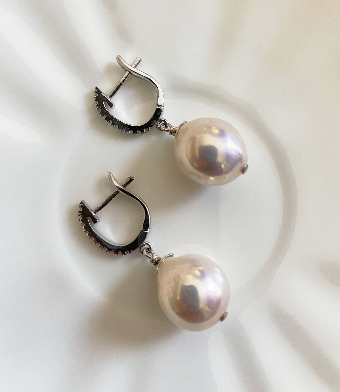 Stunning baroque pearl earrings are a perfect fashion accessory for a big event.  Custom pearl jewelry