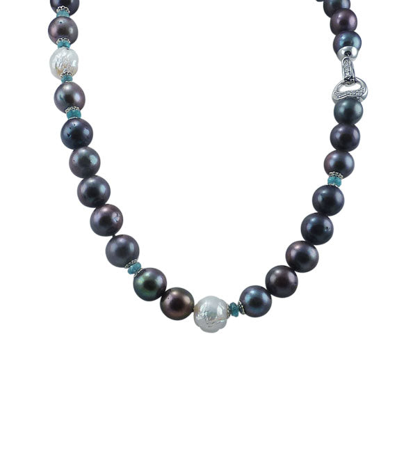 Stunning black pearl necklace with apatite features beautiful freshwater pearls having different colors and luster.