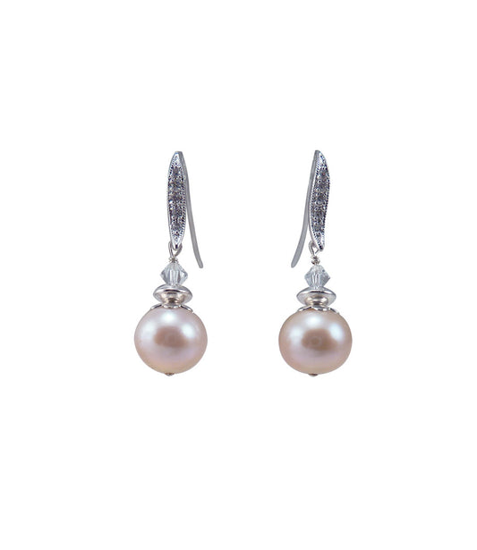 Trendy dangling pink pearl earrings featuring real freshwater pearls.  Contemporary pink pearl jewelry.  Real pearl earrings.