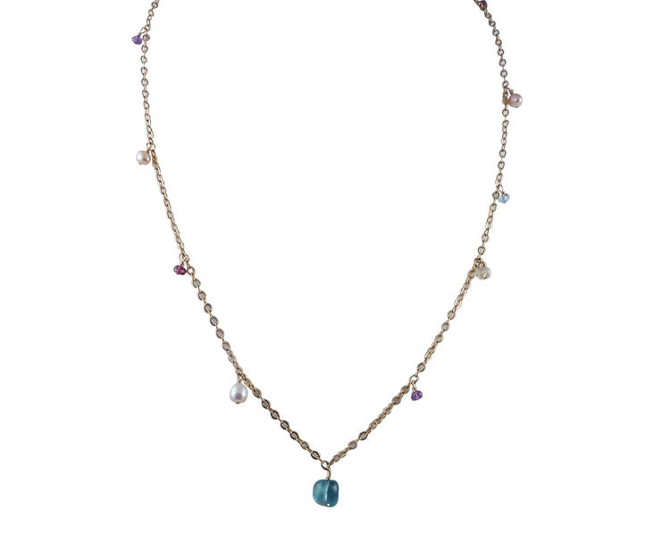 Trendy fringe pearl necklace featuring small freshwater pearls and colored gemstones
