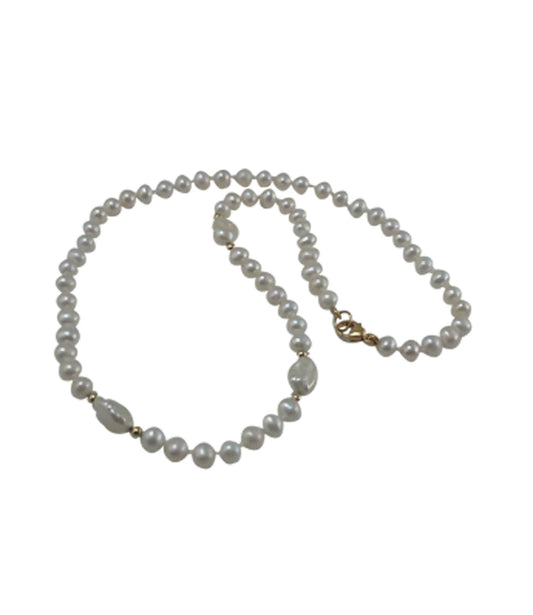 Trendy pearl choker necklace featuring freshwater white pearls.  Custom pearl jewelry.