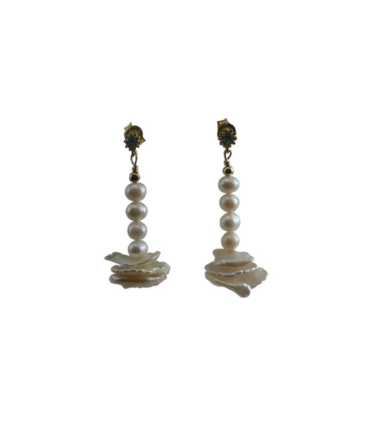 White pearl earrings with keshi pearls feature real freshwater pearls of various shapes