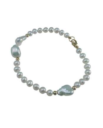 Cute small pearl bracelet with keshi pearls accents designed and created by Jewelry Olga Montreal Canada