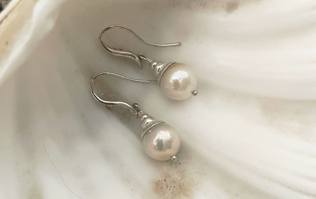 Modern dangling white pearl earrings designed and created by Jewelry Olga Montreal Canada